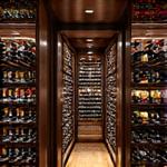 Elegant custom wine cellar with extensive collection of vintage bottles.